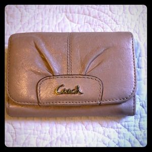 Pink coach wallet.  Good shape, no rips or stains.